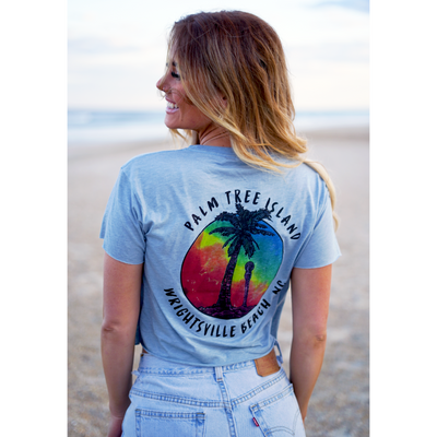 girl enjoying vacation at wrightsville beach bought a gift of a crop top